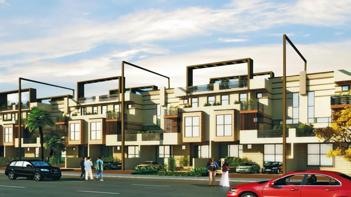 Supertech Golf Country Villas — Row of modern villas with balconies and open terraces on a sunny day, with a red car and people in the foreground.