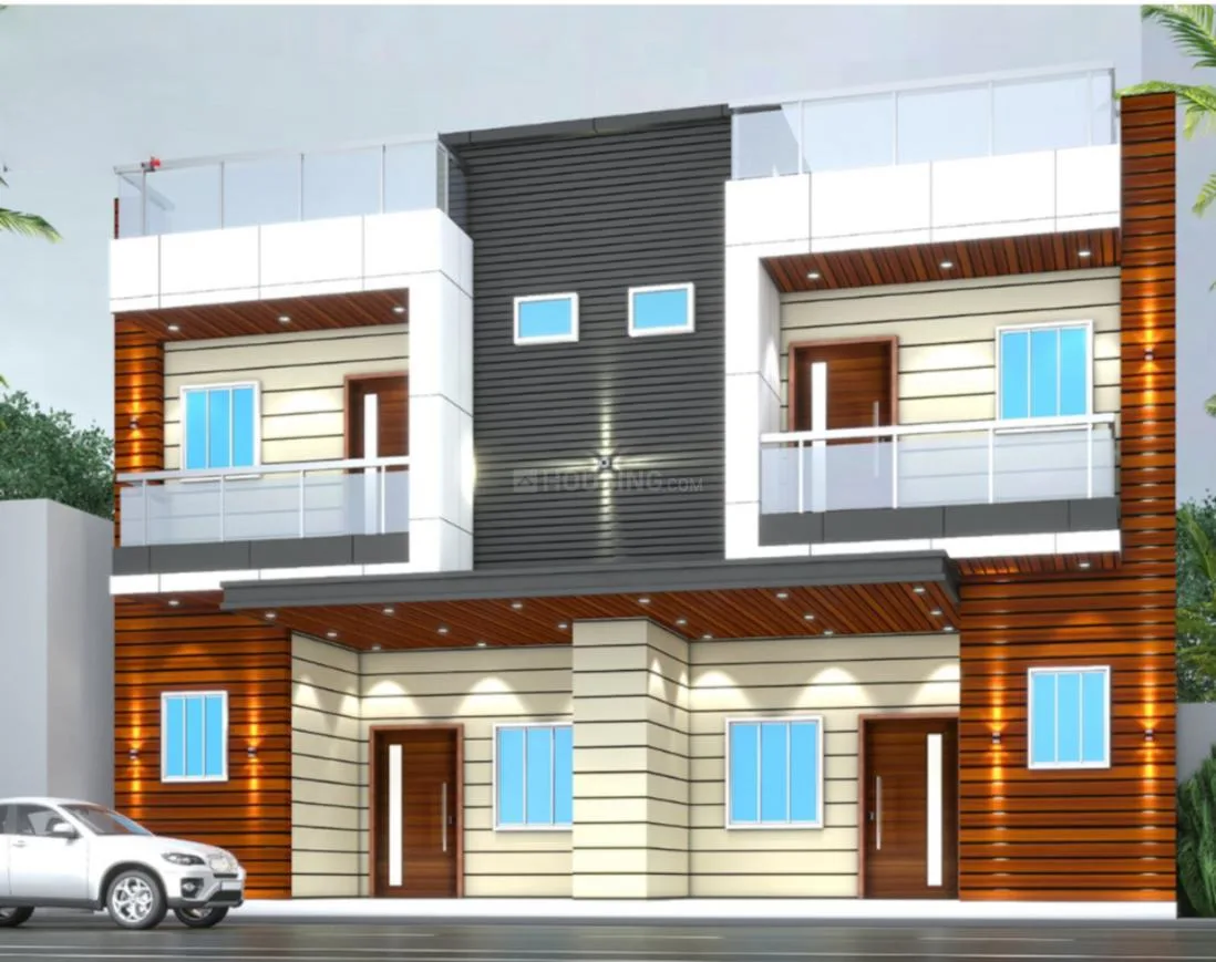 Golden Shri Ram Villas — Front view of a modern two-story duplex villa with wooden and white facades and a white car parked outside.