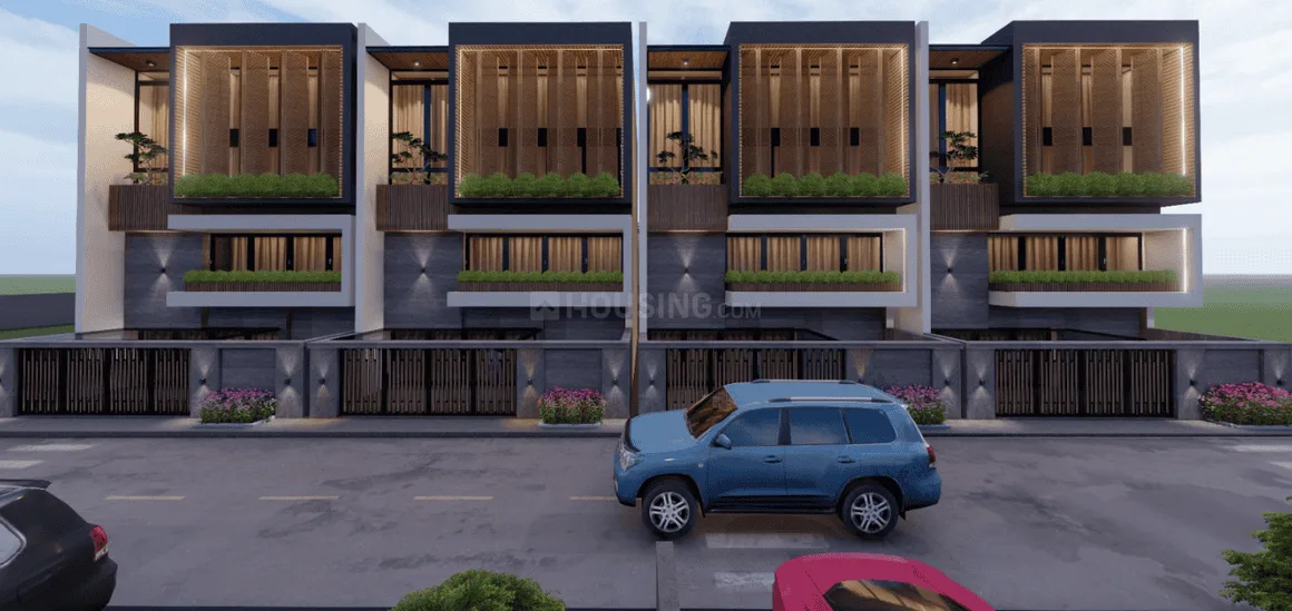 Cosy Rainbow Villa — Row of modern villas with dark facades, large windows, and green planters on balconies, seen from the street.