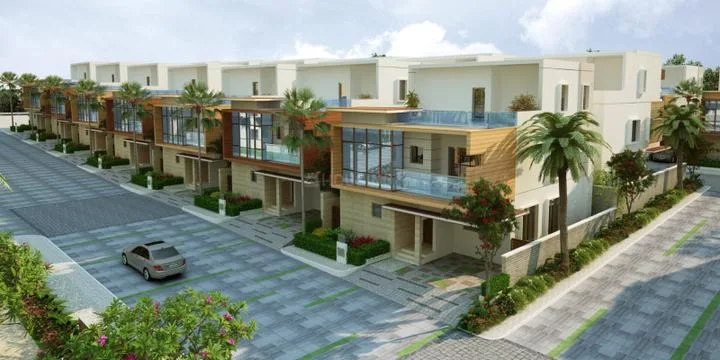 Anirudha Aroma Homes — Row of modern villas with white and wooden facades, large windows, and balconies with glass railings. Lush green landscaping
