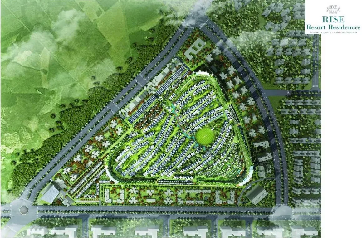 Rise Resort Residence Villa — Aerial view of a residential community with numerous villas nestled around a central green space, surrounded by roads and greenery.