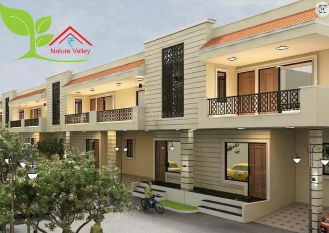 Del NCR Golden City — A 3D render showing a row of modern residential villas with balconies, light-colored exteriors, and green trees.