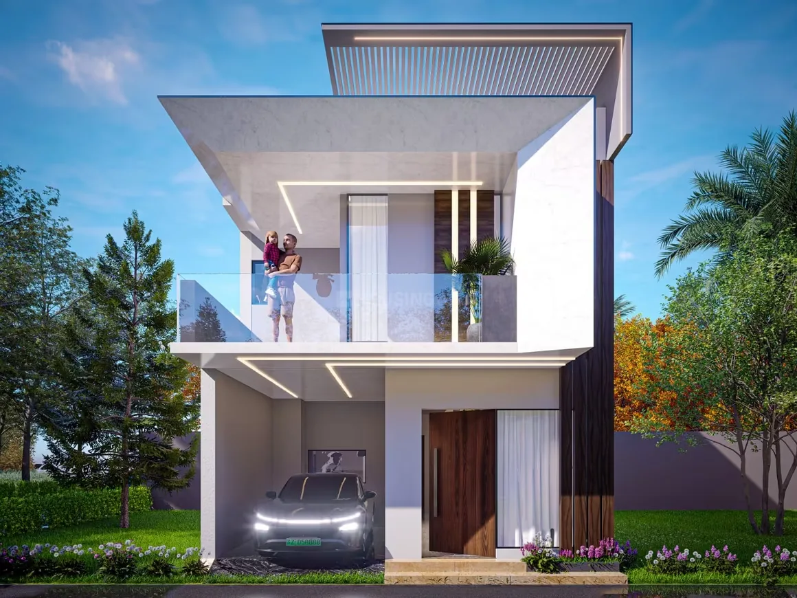 Dagar Ashiyana Prime Villas — A modern rendered villa with a car in the garage, a family on the balcony, and green landscaping.