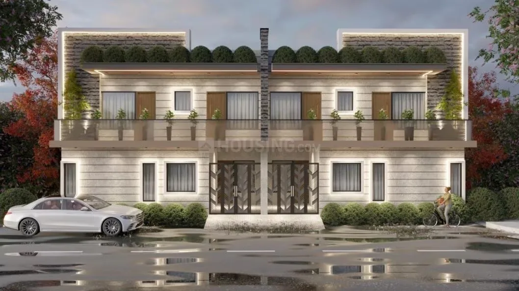 Yuvraj Villa — Front view of two modern residential villas with a white car parked on the left and a person on a bicycle